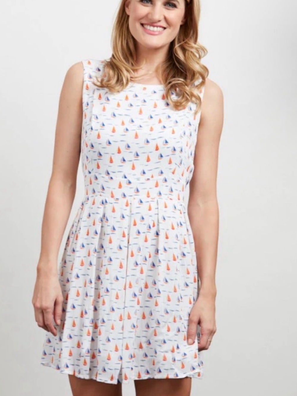 White Sleeveless Mini Dress with Orange & Blue Sailboat Print